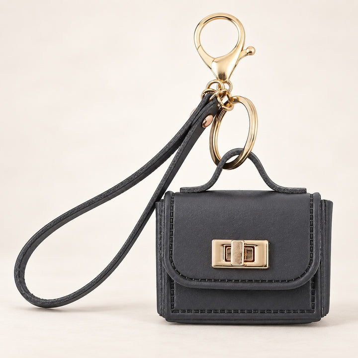 Petite Satchel Bag Charm — ce_metastatic_01